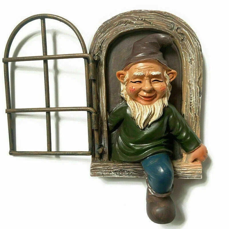 Naughty Elf Out The Door Tree Hugger Garden Statue, a charming resin gnome figure designed to hang on trees or peek out from windows and doors