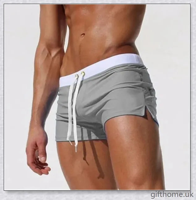 Premium low-waisted swimming trunks in a range of stylish colours, featuring a classic and flattering design for the discerning British swimmer.