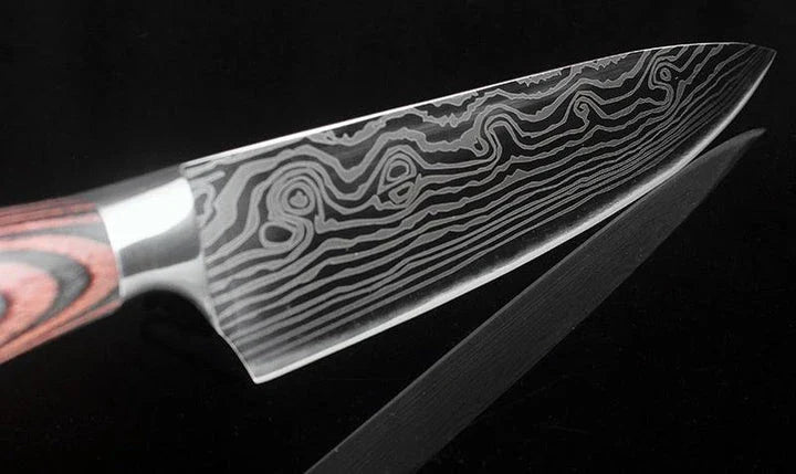 A set of three Japanese-style chef knives with stainless steel blades and ergonomic handles, perfect for slicing, dicing, and mincing in the kitchen.