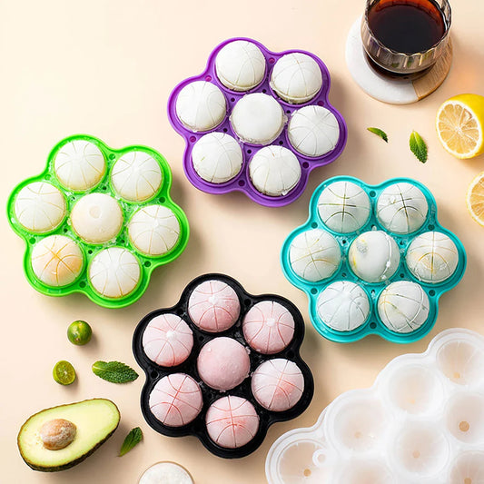 Spherical silicone ice mould with seven holes for creating perfectly round ice spheres to chill drinks