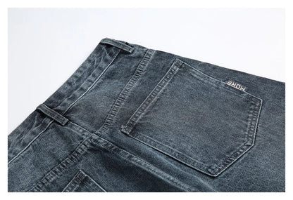 A pair of stylish retro-inspired Japanese jeans in black and grey, featuring a mid-rise waist and straight leg silhouette for a flattering, comfortable fit.
