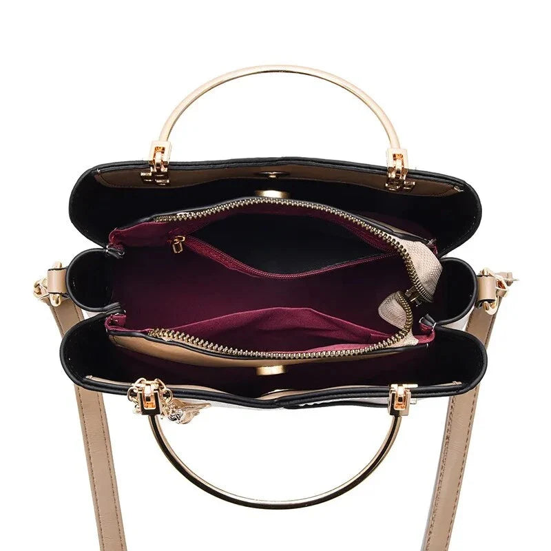 Sophisticated navy blue PU leather bucket crossbody bag with elegant patchwork design and adjustable strap