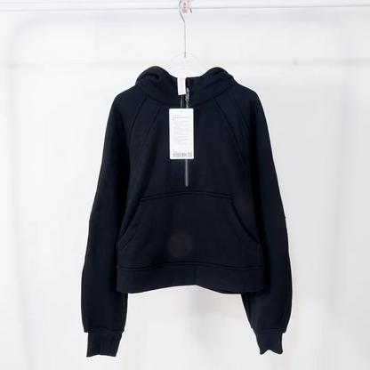 Premium women's sports fleece hoodie with half zip, available in a range of sophisticated colours