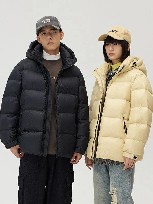 A stylish and warm down jacket with a hooded design, perfect for winter weather.