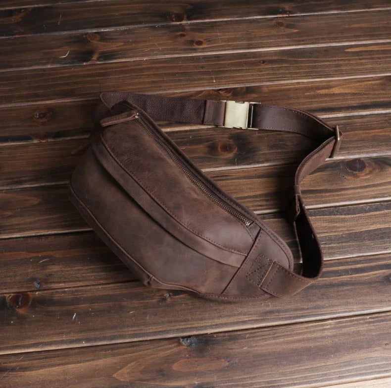 Premium British leather crossbody bag with adjustable strap and multiple pockets for organised storage