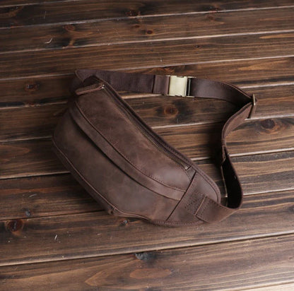 Premium British leather crossbody bag with adjustable strap and multiple pockets for organised storage