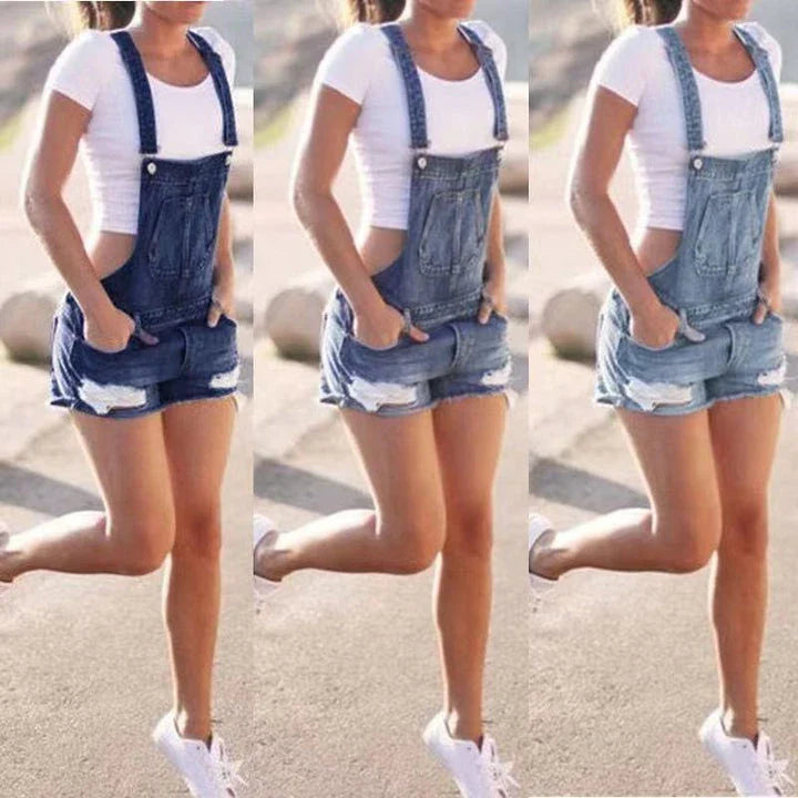 Premium British-made denim overalls shorts in classic blue hues, featuring adjustable suspenders for a tailored fit