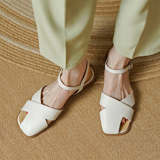 Stylish and comfortable low-heel leather sandals in green, perfect for summer wear