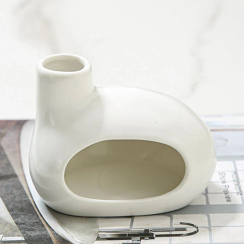 Elegant ceramic tabletop incense burner with Palo Santo wood aroma, available in light brown, white, and grey colours