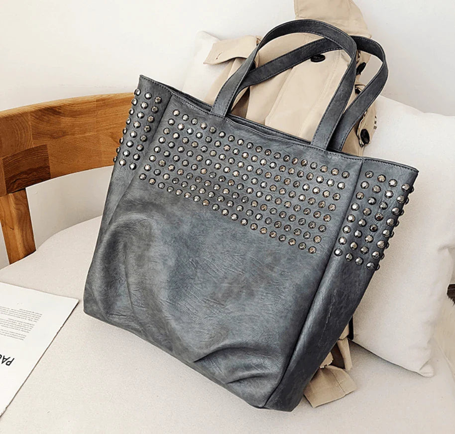 Premium British leather tote bag in black, featuring a large capacity design and stylish, versatile appeal.