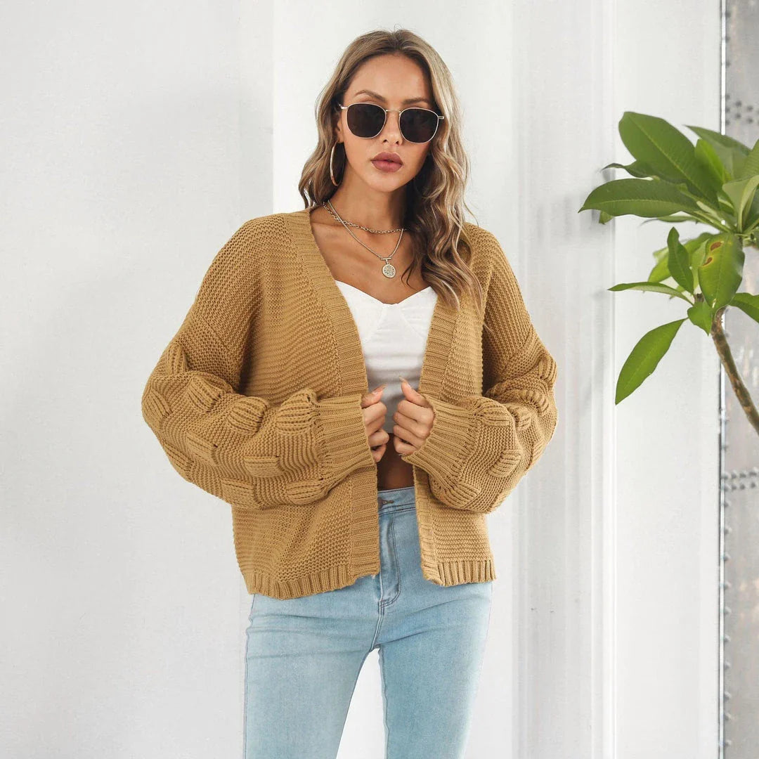 Elegant puff sleeve cardigan sweater in army green and wheat yellow colours, featuring a chunky knit design for cosy winter wear