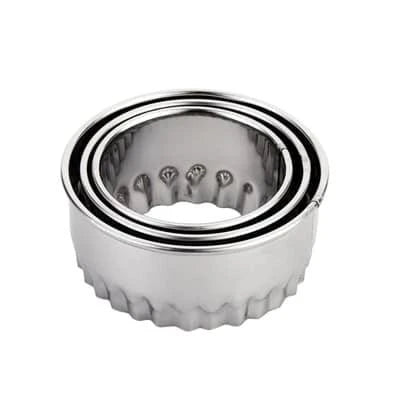 Premium stainless steel dumpling maker set with three distinct mold sizes for creating a variety of dumpling shapes