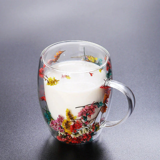 Elegant double-walled glass tea mug with captivating floral display, perfect for hot and cold beverages