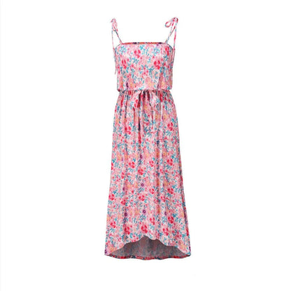 A premium printed camisole dress in a vibrant red colour, featuring a flattering mid-length skirt and high-waist design for a sophisticated, feminine look.