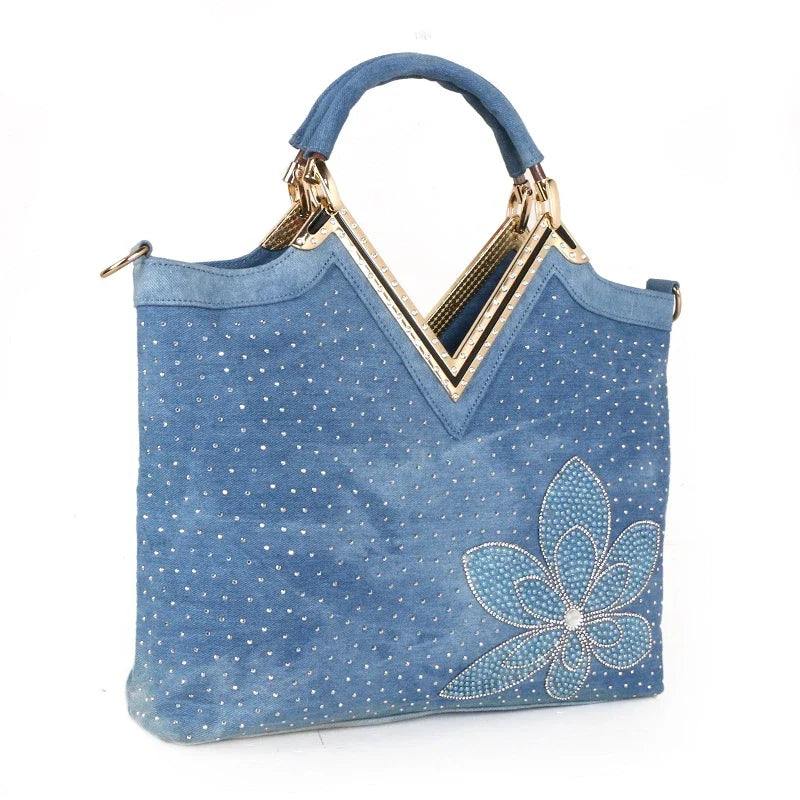 Light blue denim crossbody bag with sparkling diamond-inspired detailing from Trendha