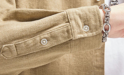 A relaxed, loose-fitting men's shirt in a retro-inspired design, crafted from premium cotton for exceptional comfort and style.