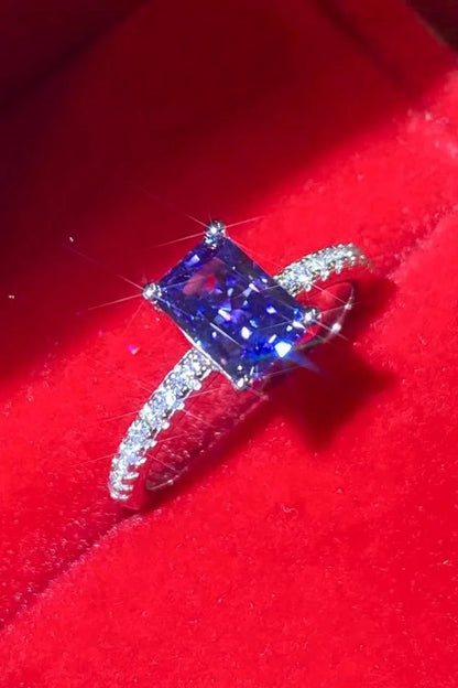 Elegant 1 Carat Moissanite Sterling Silver Ring in a beautiful blue hue, showcasing a minimalist design and premium construction.