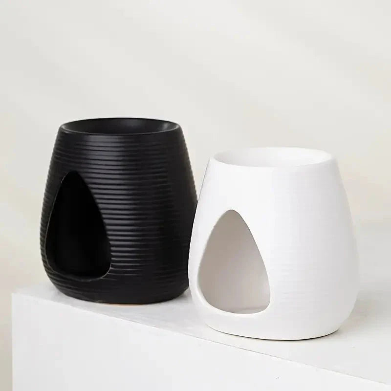 Trendha Porcelain Aroma Diffuser and Candle Holder in white and black finishes, featuring a minimalist design for stylish home decor and relaxing aromatherapy