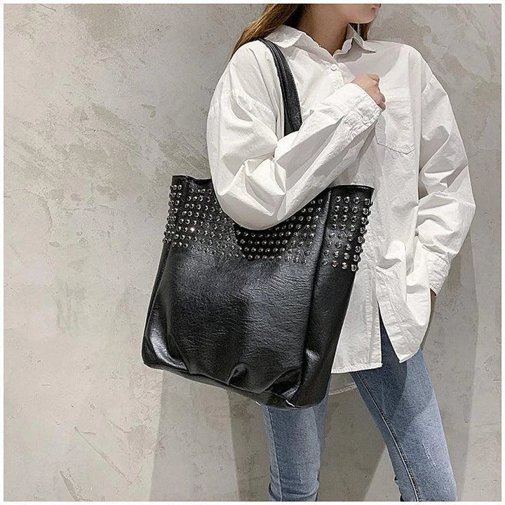 Premium British leather tote bag in black, featuring a large capacity design and stylish, versatile appeal.