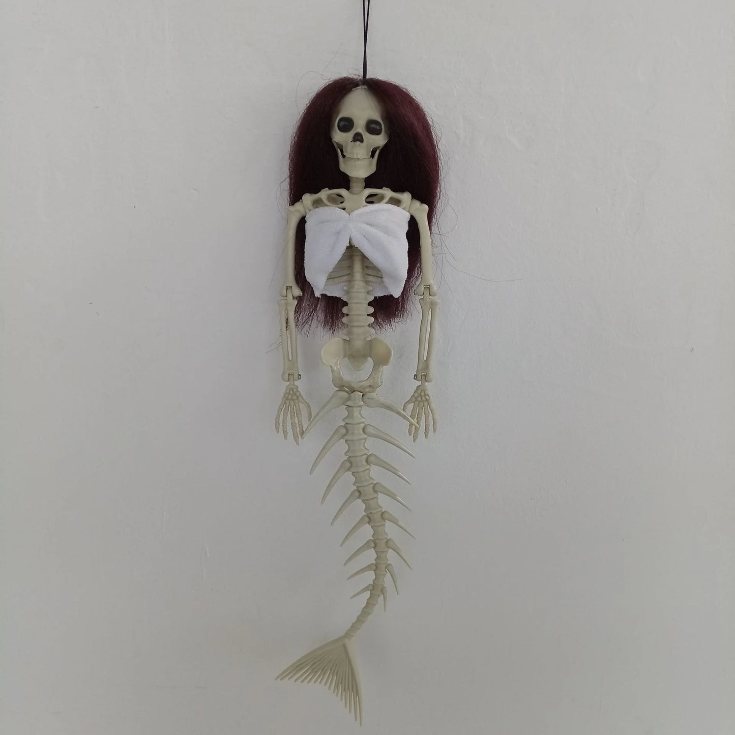 Mermaid bone pendant decoration in brown, dark purple, burgundy, and lake blue colours, ideal for Halloween outdoor courtyard displays