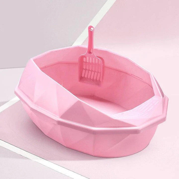 A stylish, crystal-shaped detachable semi-enclosed cat litter tray in pink colour, designed to provide privacy and reduce litter scatter for your feline friend.