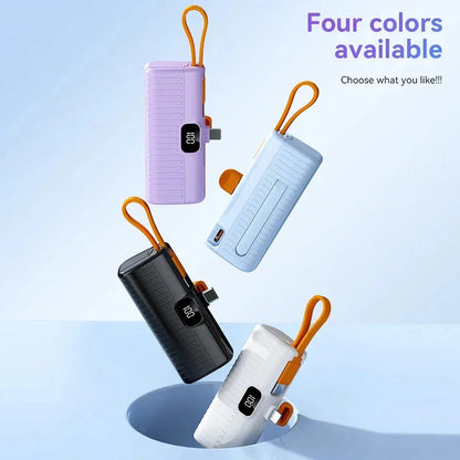 Compact, high-capacity power bank with dual charging ports and built-in cables for convenient, fast charging on the go