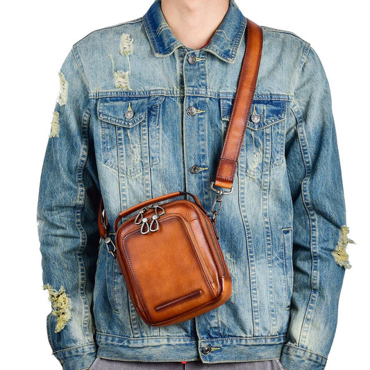 Premium retro leather messenger bag with spacious main compartment, side pockets, and robust handle for comfortable carrying