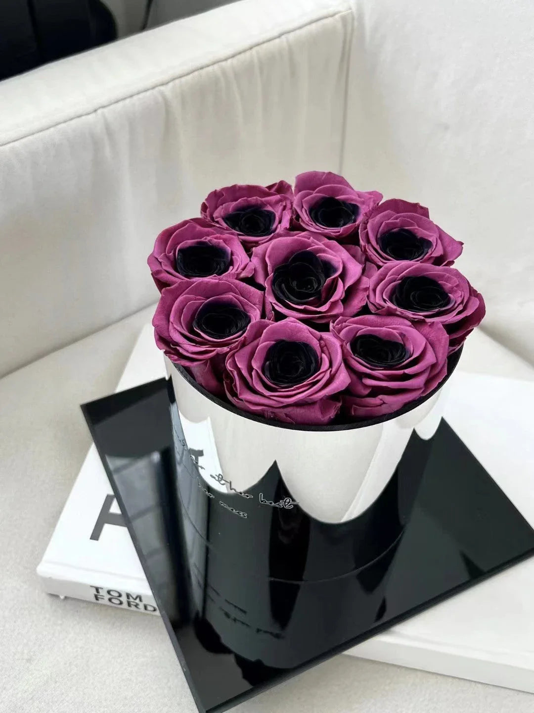 Elegant black plum bow flower pot with preserved plum blossoms, a sophisticated and long-lasting home decor piece