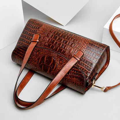 Premium crocodile pattern leather shoulder bag in multiple colours, featuring a pillow-shaped design for comfortable carrying and multiple interior pockets for organisation.