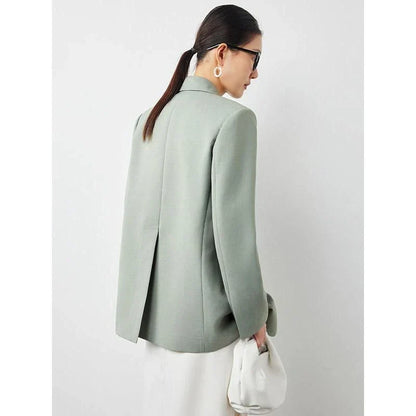 Elegant green double-breasted blazer with a stylish design and premium materials for a sophisticated look