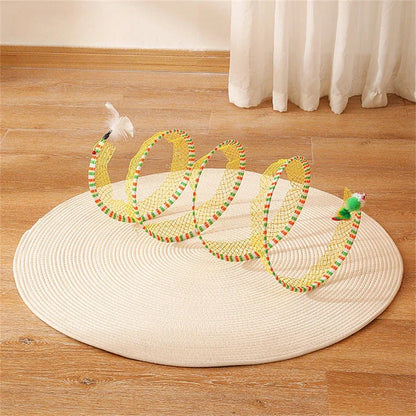 Folding cat play tunnel with various toys like balls, feathers, and mice attached to the sides