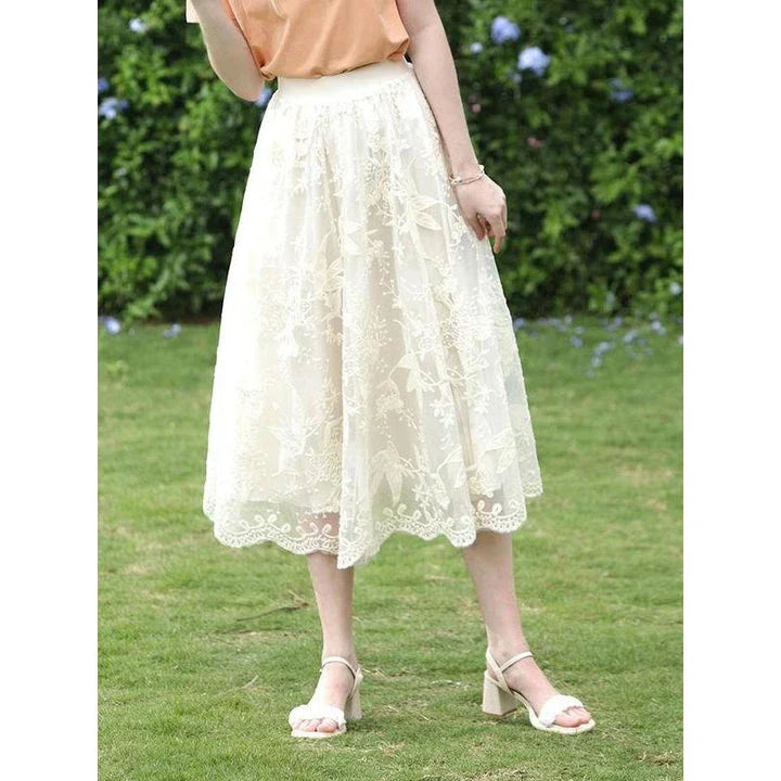 Elegant floral lace A-line skirt in apricot colour, featuring a flattering silhouette and intricate embroidery