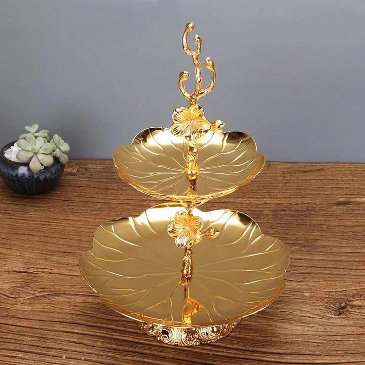 Elegant gold wedding cake stand with a sleek and sturdy metal construction, perfect for showcasing your wedding cake in style.