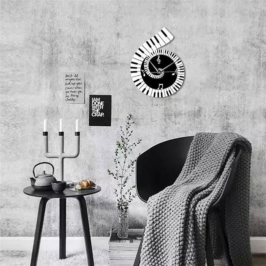 Decorative wall clock with treble clef and piano keyboard design in black and white