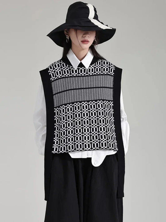 Women's black sleeveless vest with irregular knitting pattern, a versatile and stylish layering piece for the modern British woman