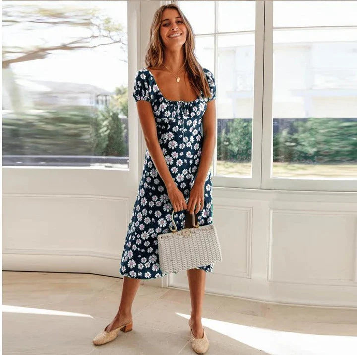 Elegant floral square collar dress with cinched hem, available in navy blue, green, and red colours