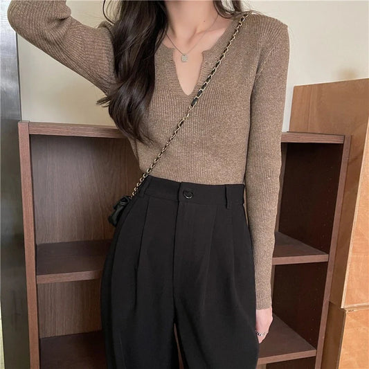Premium V-neck knit top for women in a variety of colours, featuring a flattering slim fit and soft, comfortable fabric