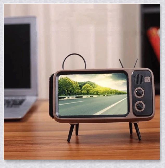 Retro TV-inspired phone stand with built-in Bluetooth speaker for hands-free entertainment and music playback
