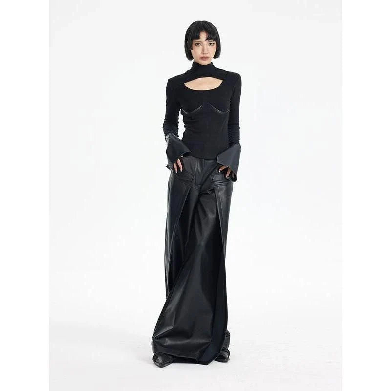 Chic knitted pullover with PU leather patchwork details, a versatile winter wardrobe essential.