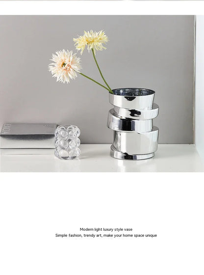 Electroplated silver glass vase with a modern, geometric design for home decor