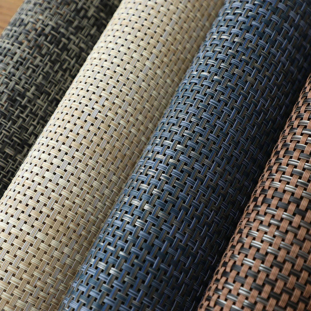 Stylish and durable waterproof placemats in black, protecting a dining table from spills and stains