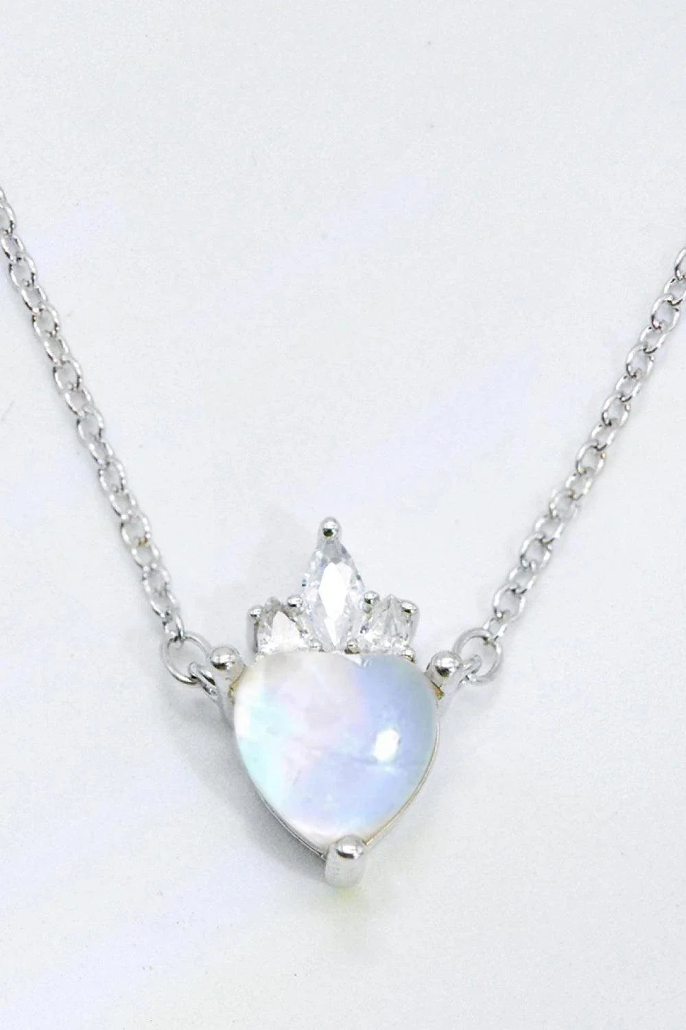 Sterling silver necklace with a natural moonstone heart-shaped pendant