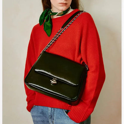 Fashionable large-capacity leather shoulder bag with adjustable crossbody strap and secure hasp closure