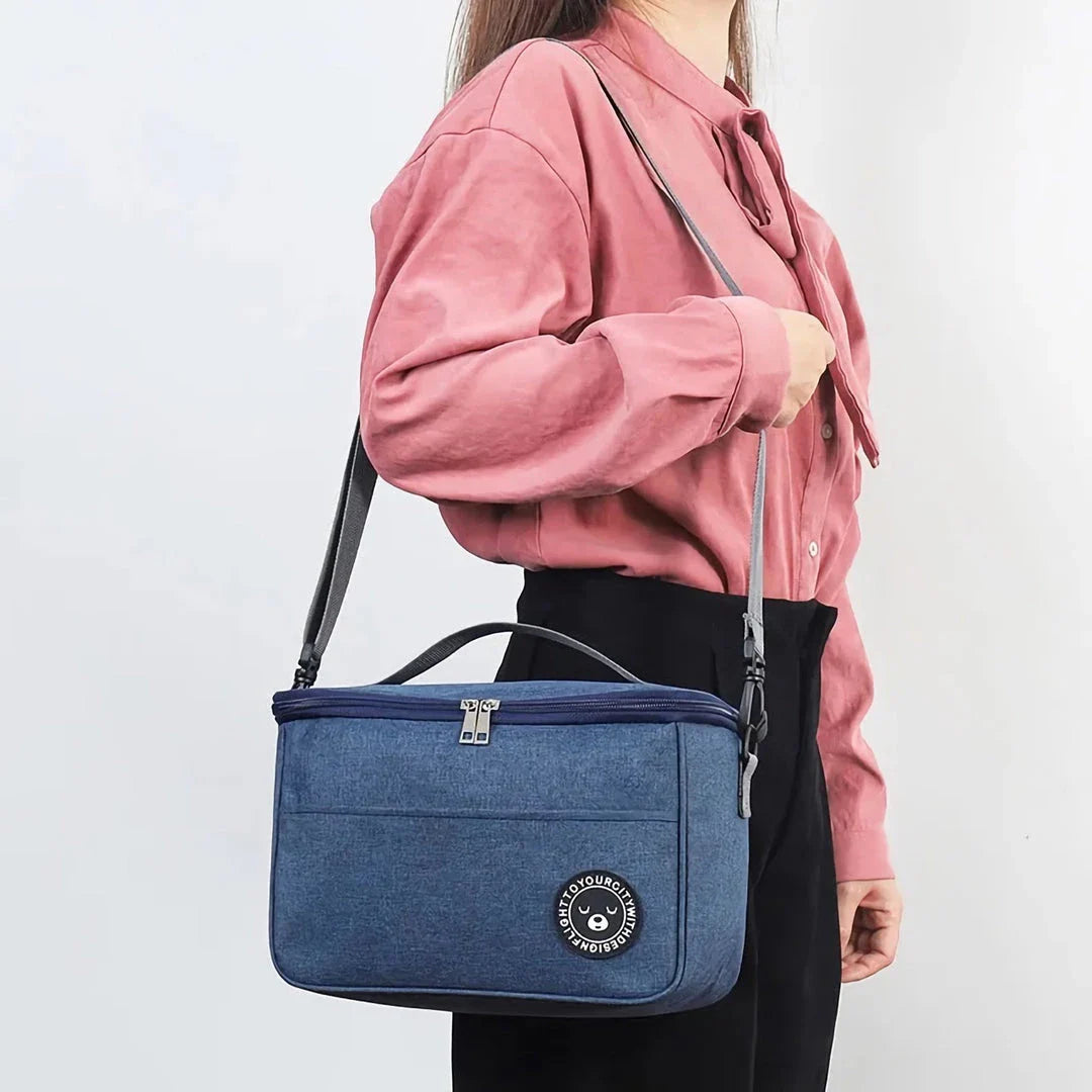 Premium thermal lunch bag in various colours, featuring insulation, waterproof design, and adjustable shoulder strap for busy UK professionals