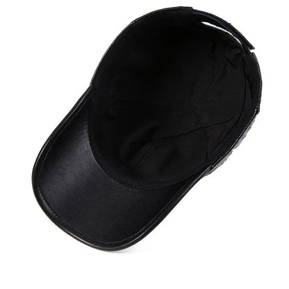 A stylish men's baseball cap made from warm, first-layer cowhide leather with an eye-catching ostrich pattern design.
