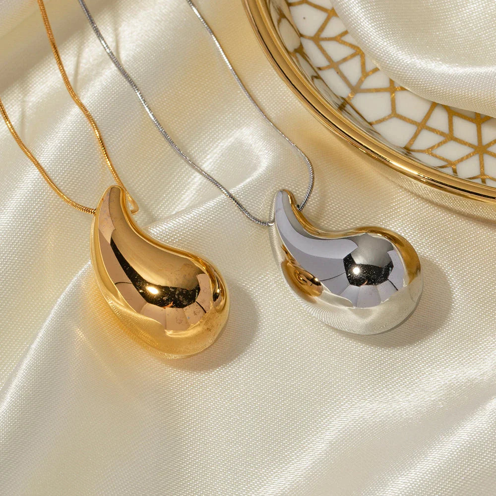 Elegant gold-plated stainless steel necklace with a large, sparkling waterdrop-shaped pendant