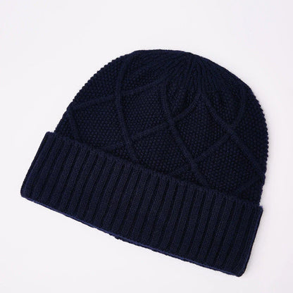 Premium knitted hat in various colours with a dome-shaped design, concave stripe pattern, and adjustable fit for warm outdoor fashion