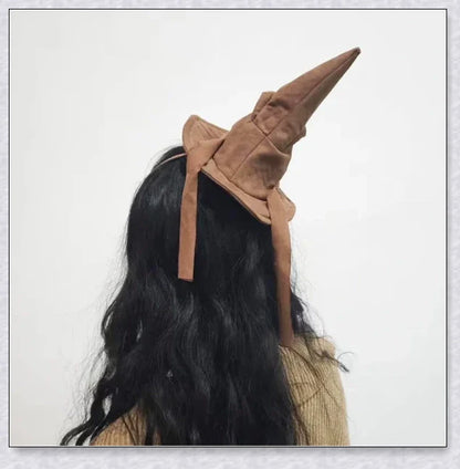 Sortband Halloween Witch Hat Headband in red, green, and brown colours with a detachable witch hat design