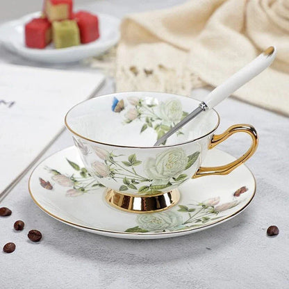 Charming floral porcelain tea set with cup, saucer, and spoon in a variety of delicate colour options