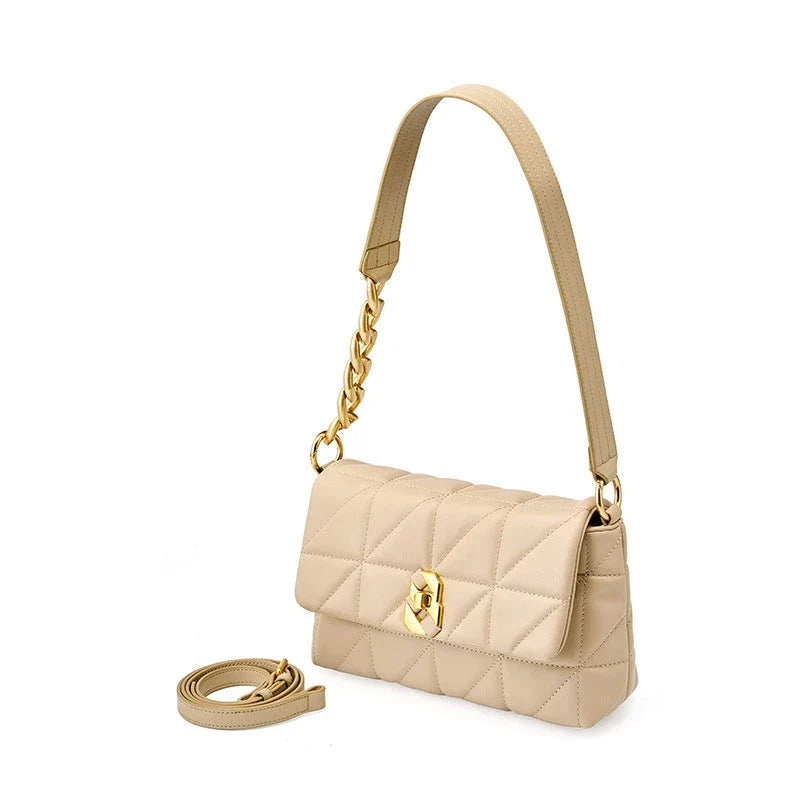 Premium genuine leather crossbody bag in a classic white colour, featuring an adjustable strap and a spacious interior with a zipper pocket.